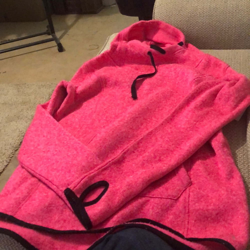 Vibrant pink sweatshirt.